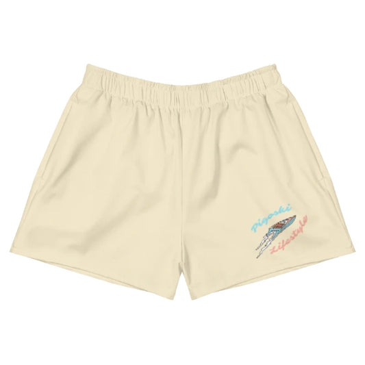 Beige shorts with a colorful graphic on a white background