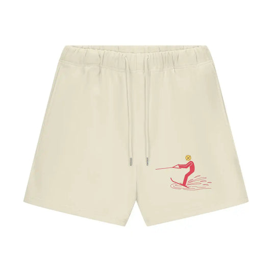 Beige shorts with a red graphic on a white background