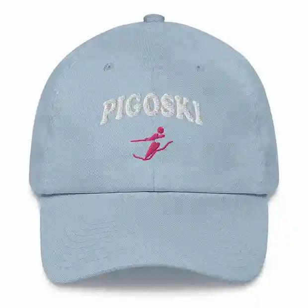 Light blue cap with 'PIGOSKI' and a logo on a white background