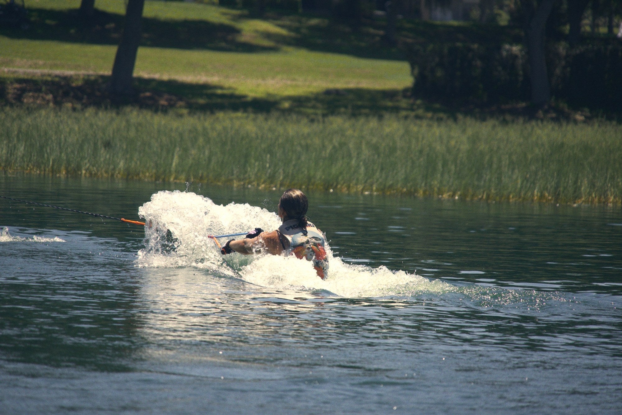 Behind the boat on the slalom course