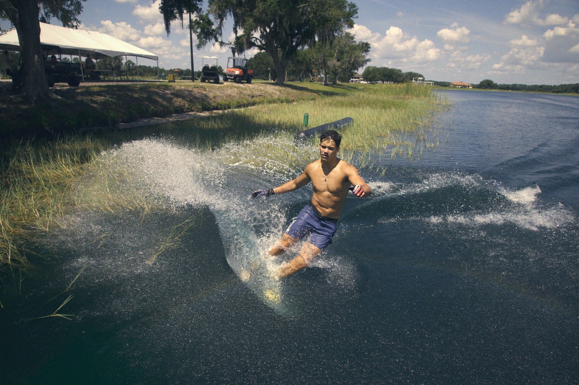 Slalom set — carving spray off the buoy