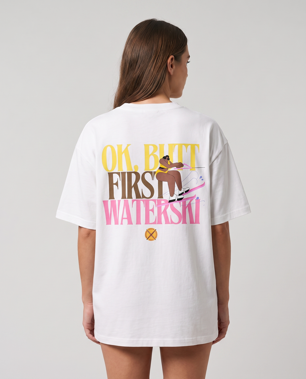PIGOSKI Butt First Skier Tee on model — studio fit shot (back print)