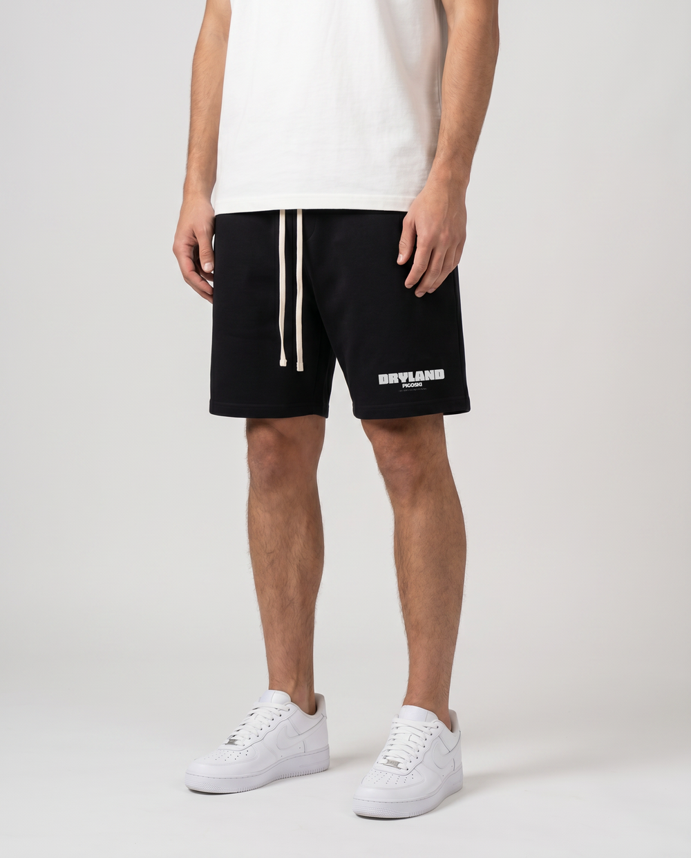 PIGOSKI Dryland Essential Cotton Shorts on model — studio fit shot