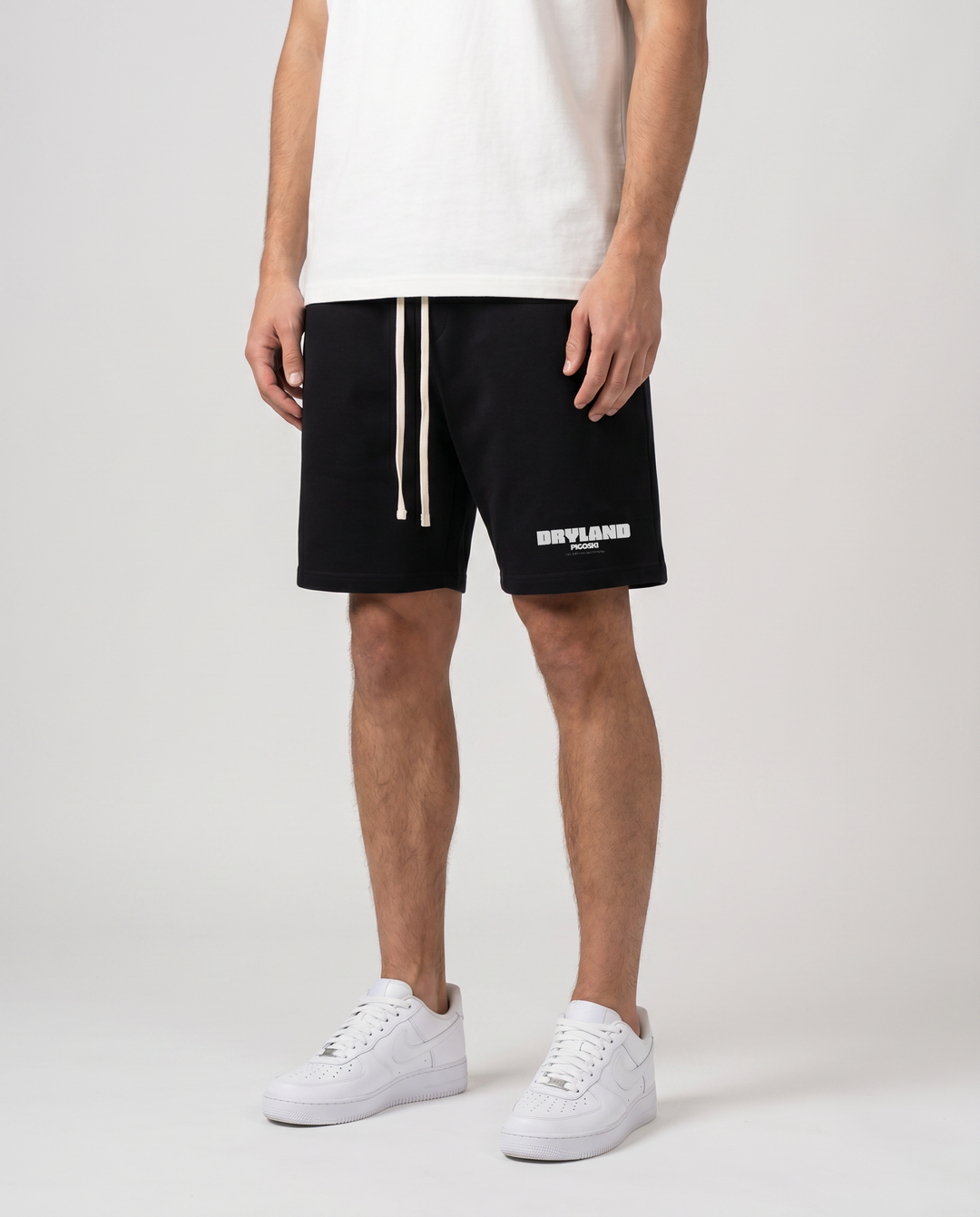 PIGOSKI Dryland Essential Cotton Shorts on model — studio fit shot
