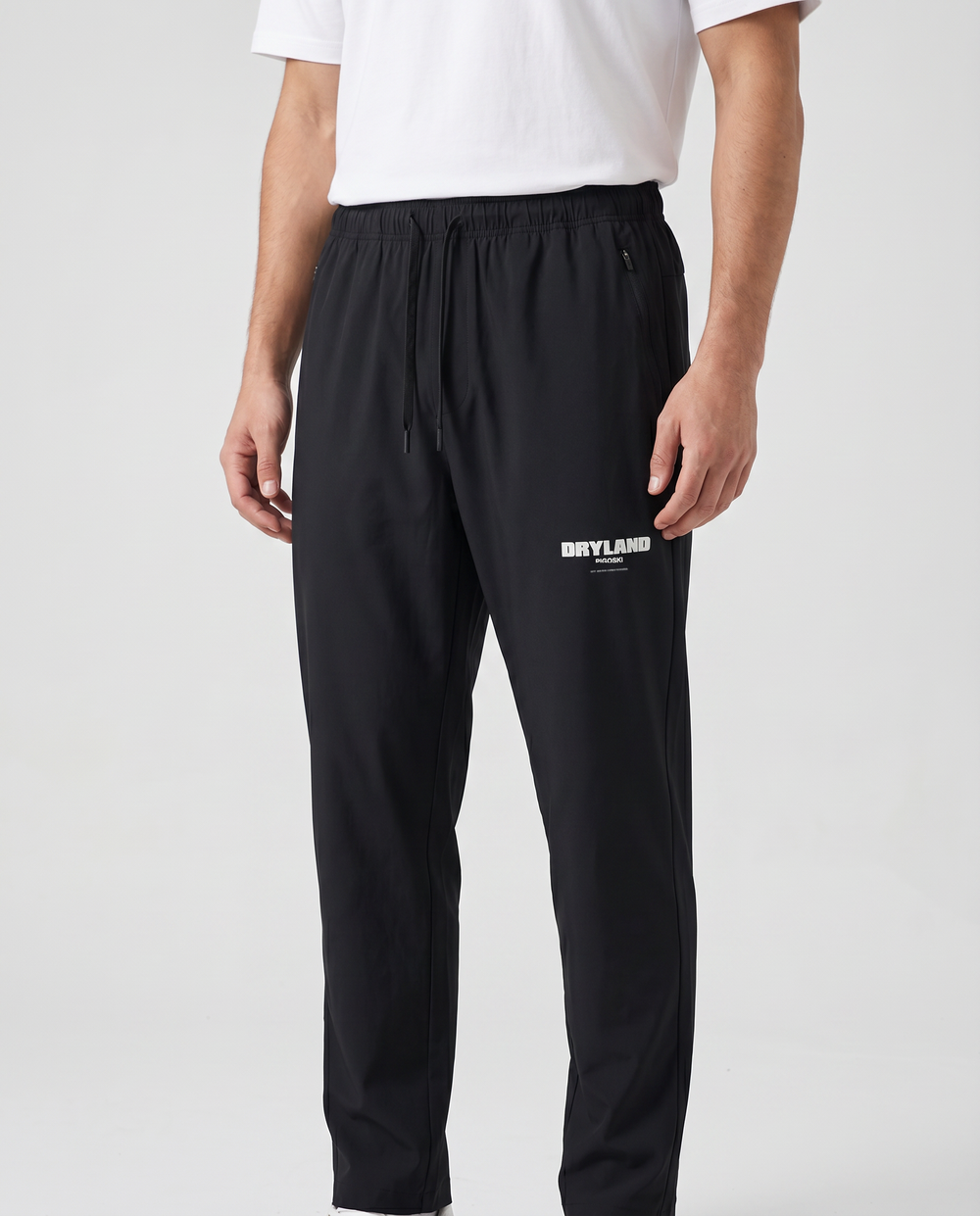 PIGOSKI Dryland Tapered Track Pants on model — studio fit shot