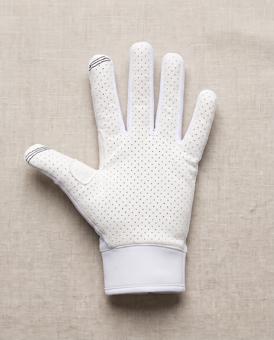 PIGOSKI GMS V1 waterski glove, White — studio shot, perforated Amara palm