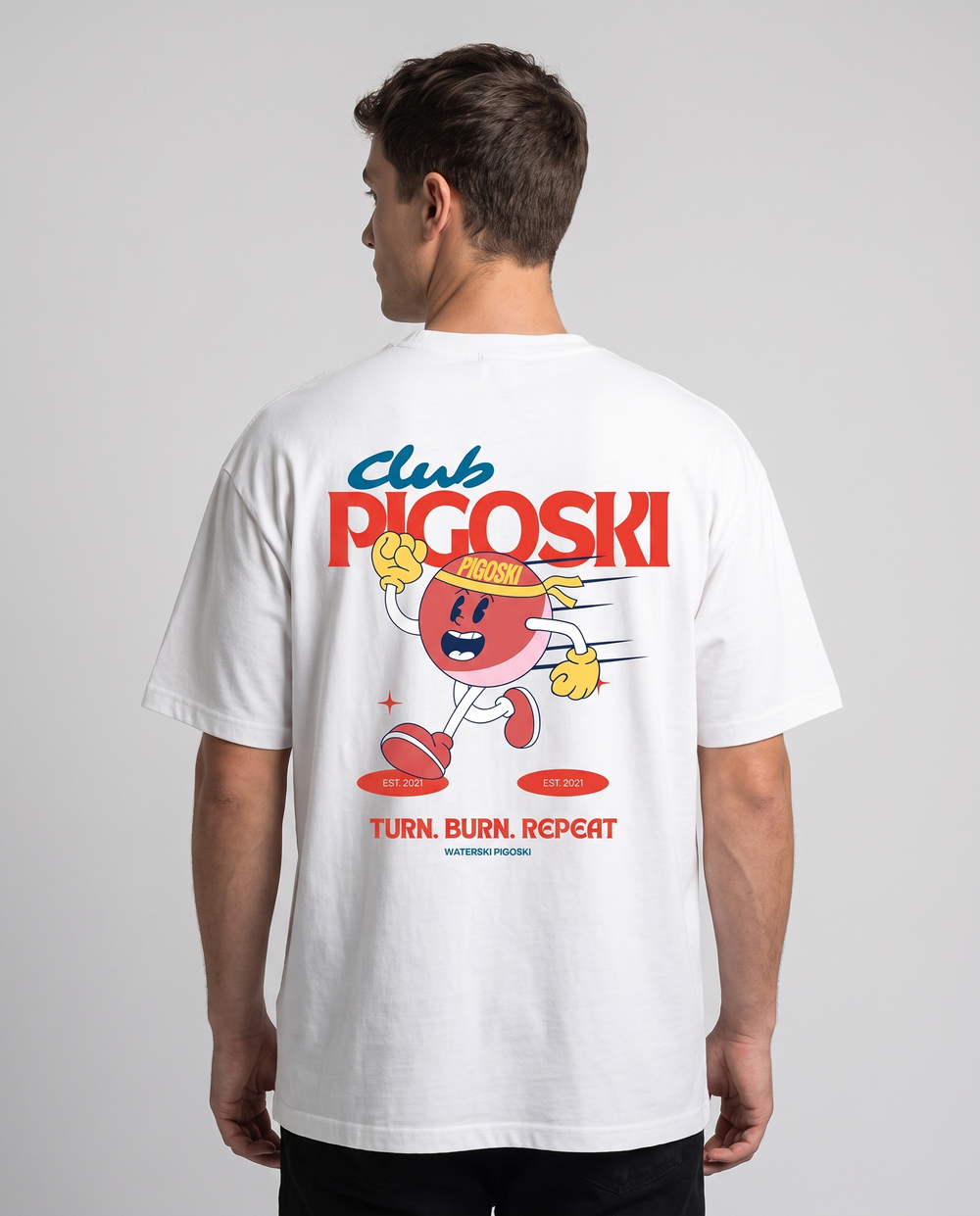 PIGOSKI Mascot Tee — Pure Cotton on model — studio fit shot (back print)