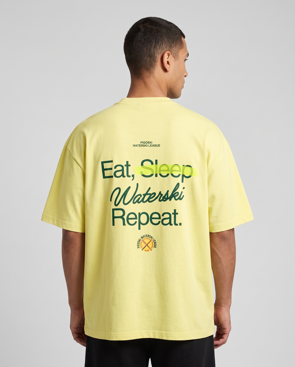 PIGOSKI Ritual Tee on model — studio fit shot, back print