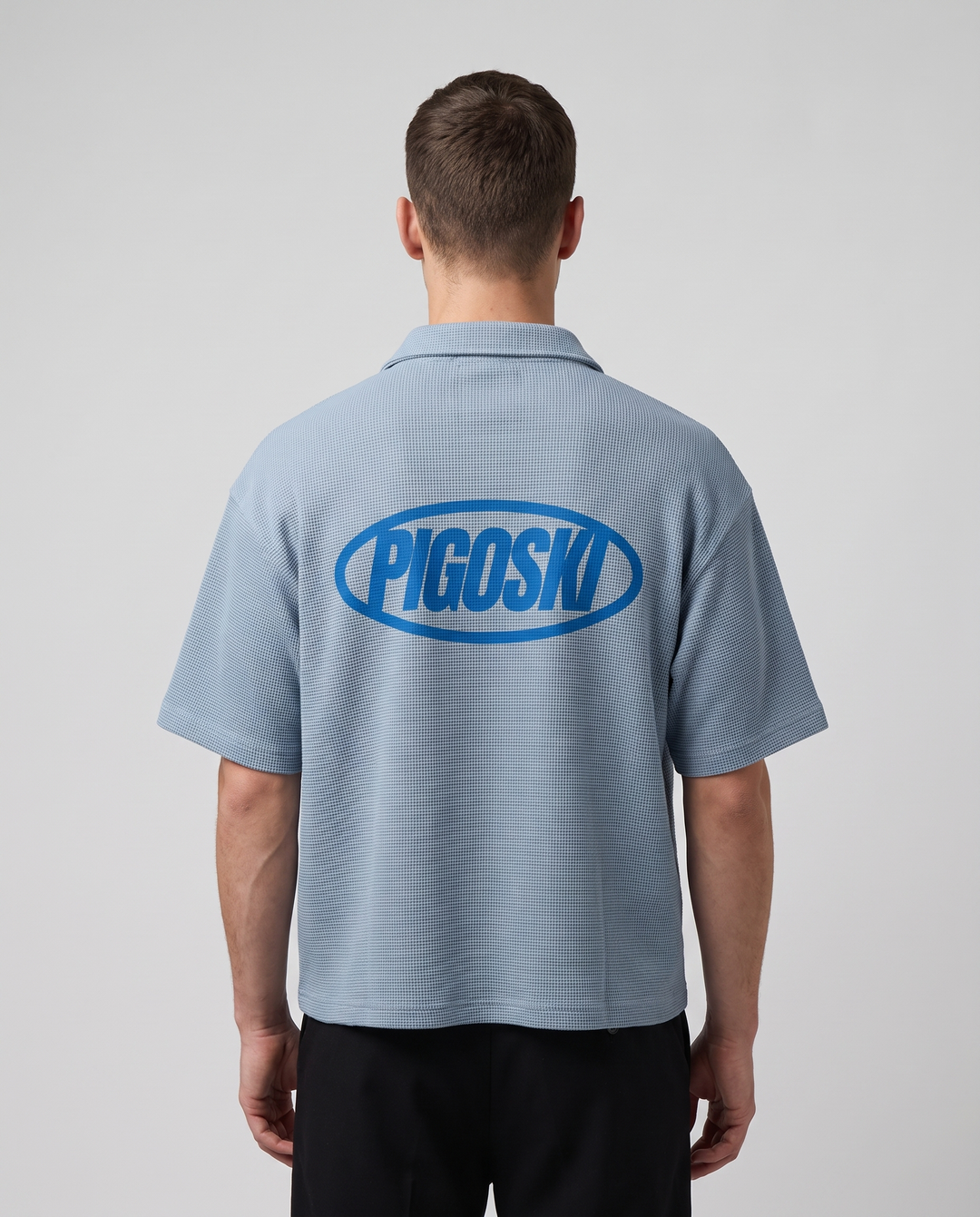 PIGOSKI Waffle Polo — Boxy on model — studio fit shot